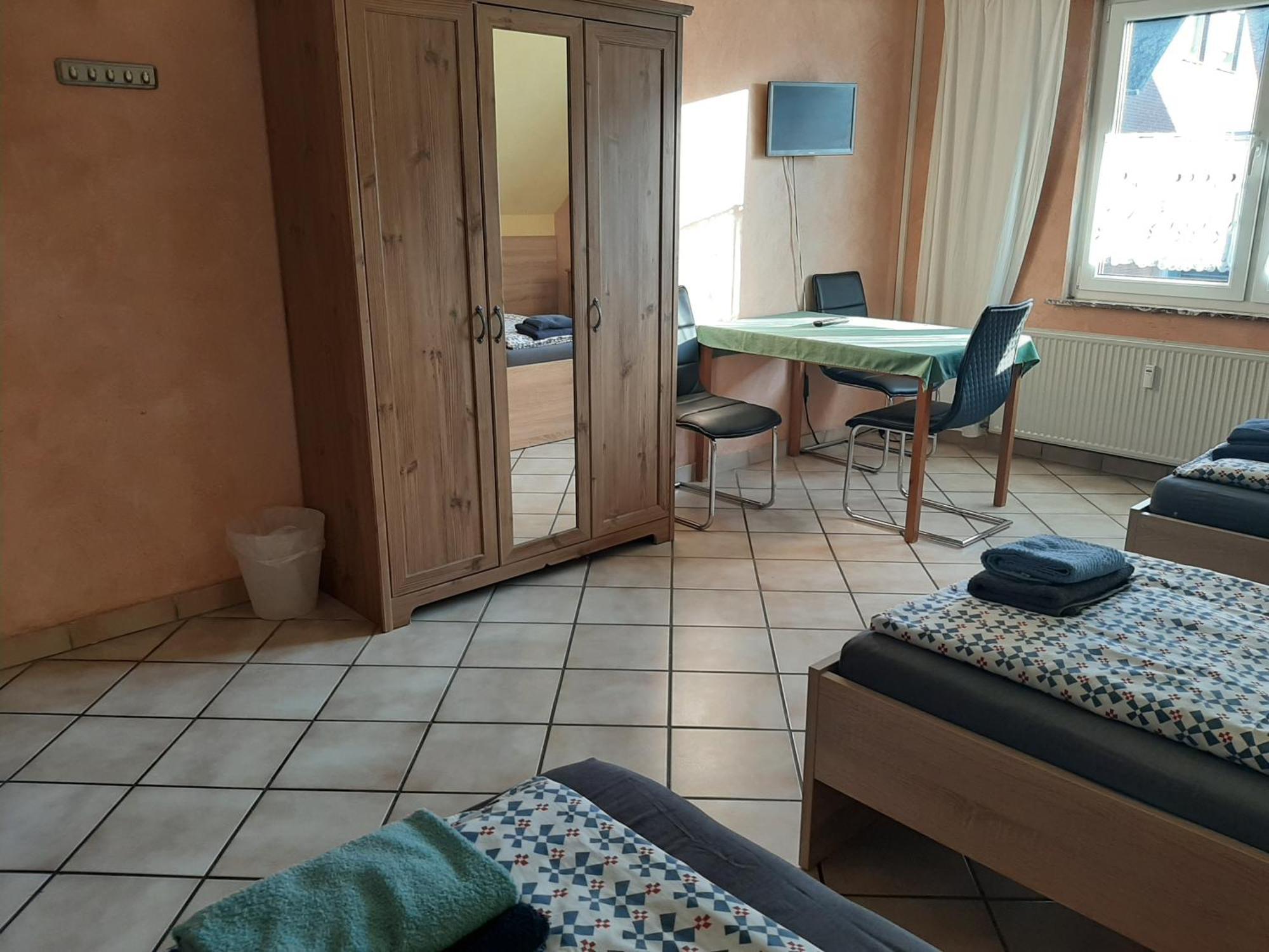 Haus Roseneck-Pension Am Stadtrand Borchen Quarto foto