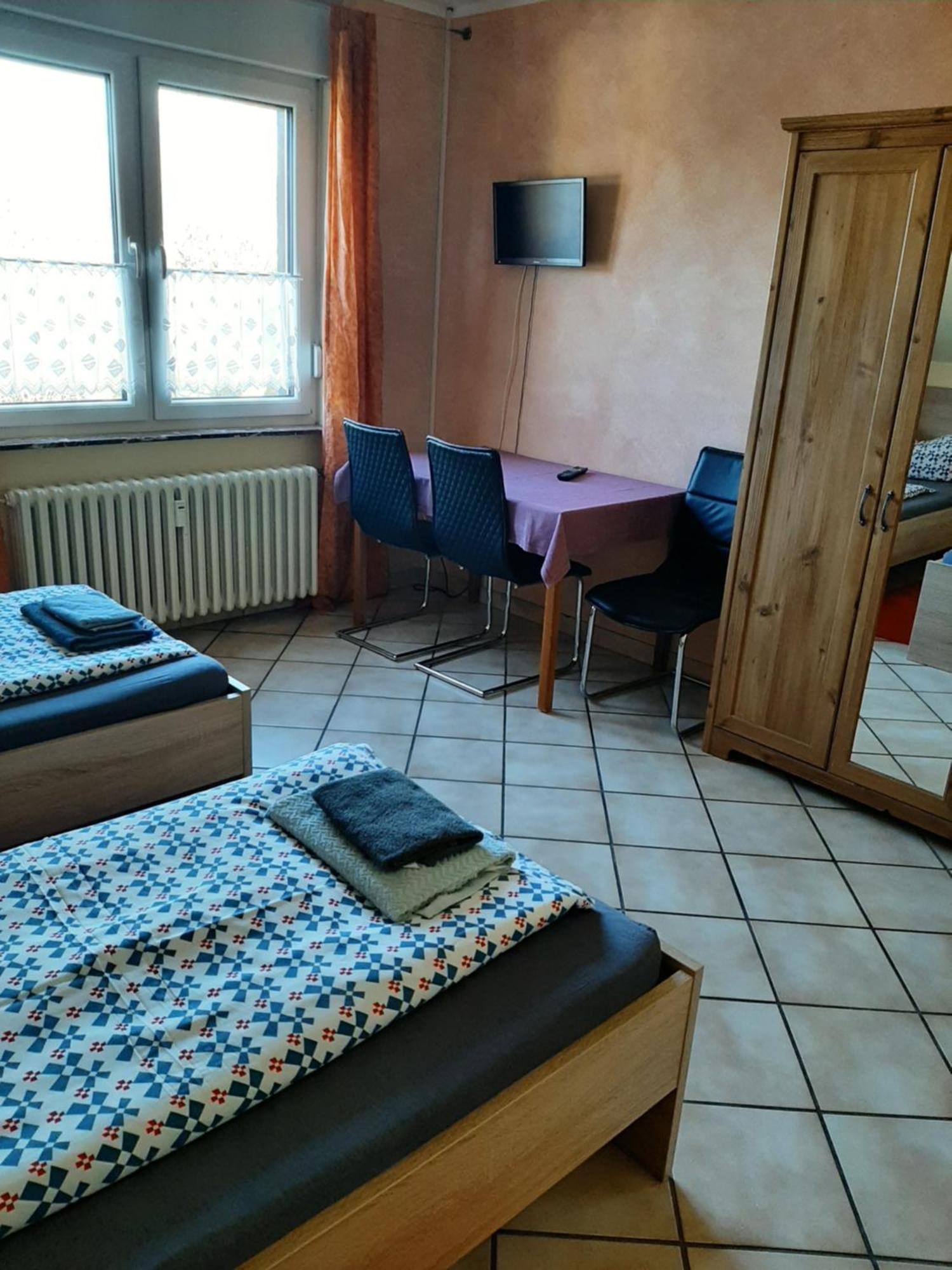 Haus Roseneck-Pension Am Stadtrand Borchen Quarto foto